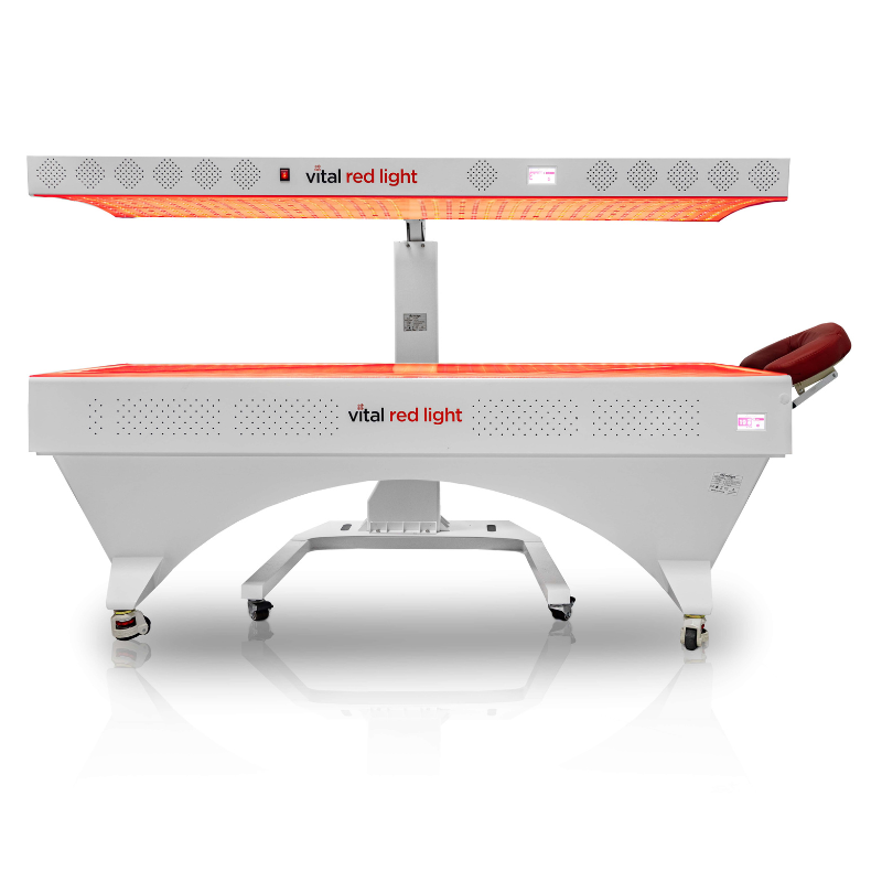 Vital Bed full body red light therapy system with overhead panel illuminated